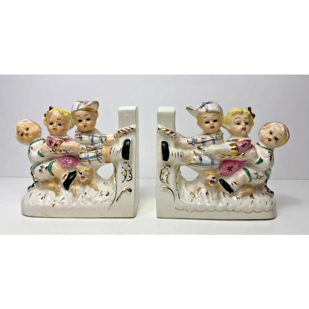 Vintage Ceramic Children Boys Girls Tug of War Bookends Set 2 Dog Royal Sealy?